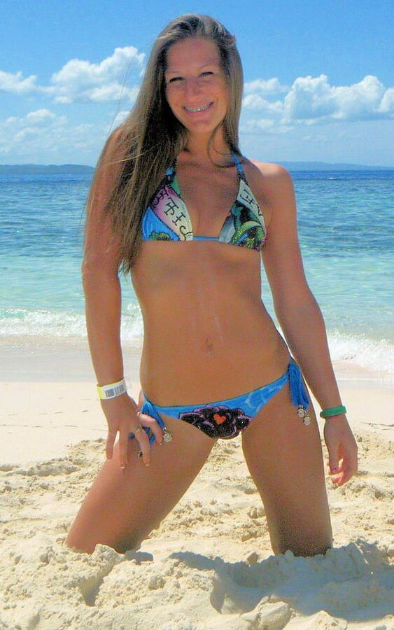 Sarah Takes On Tiny Blue String Bikini