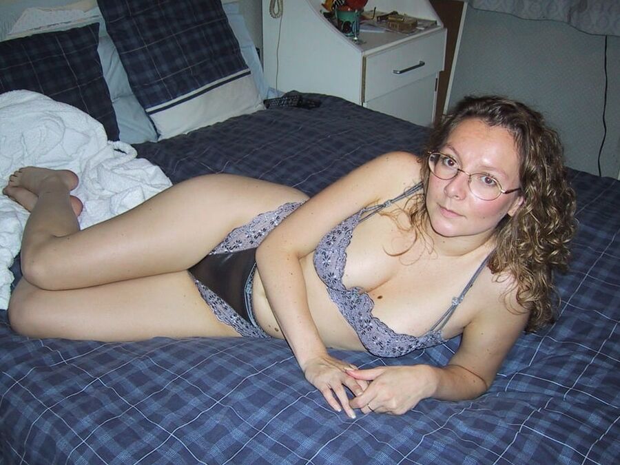 Curly milf show a bit