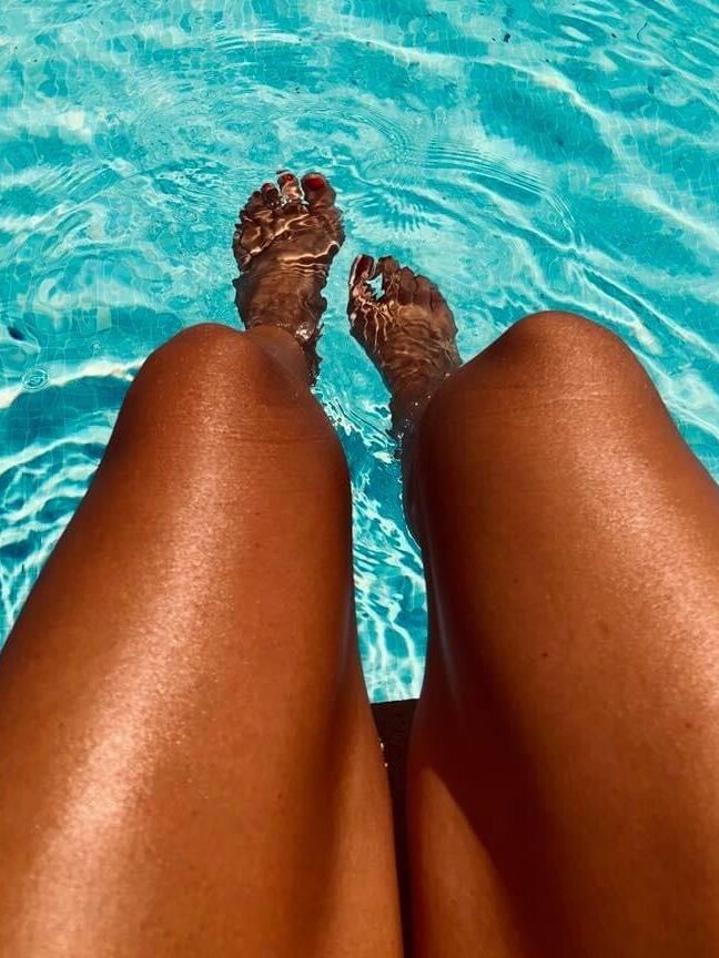Legs and feet of a pretty reader