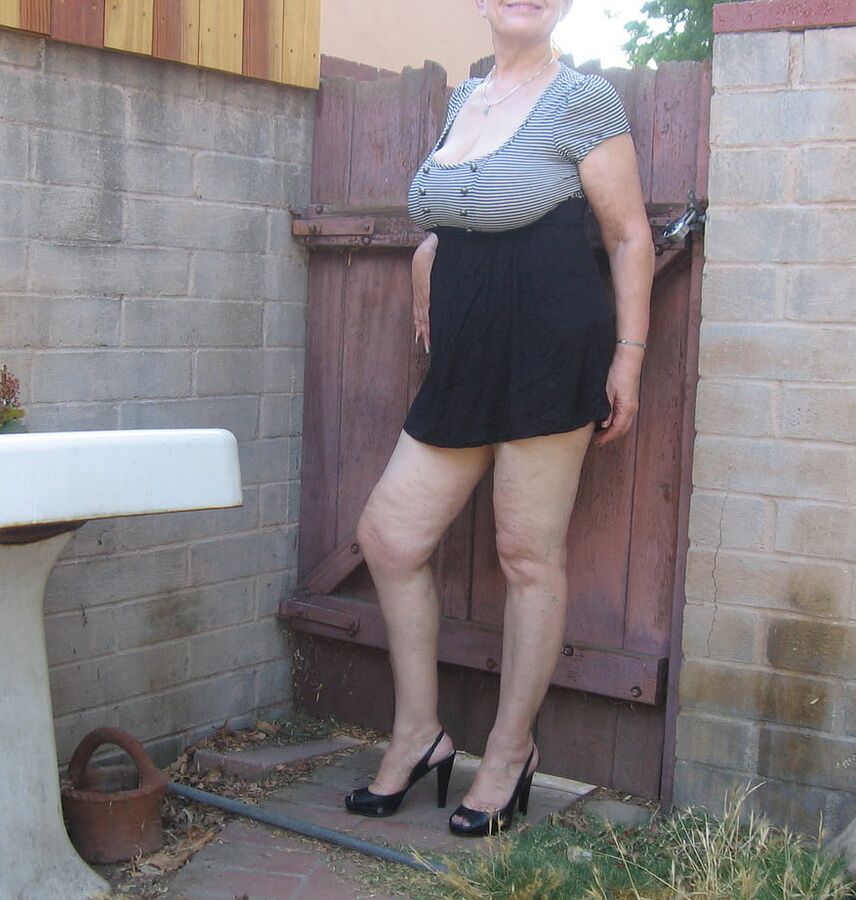 Brunette granny with big tits