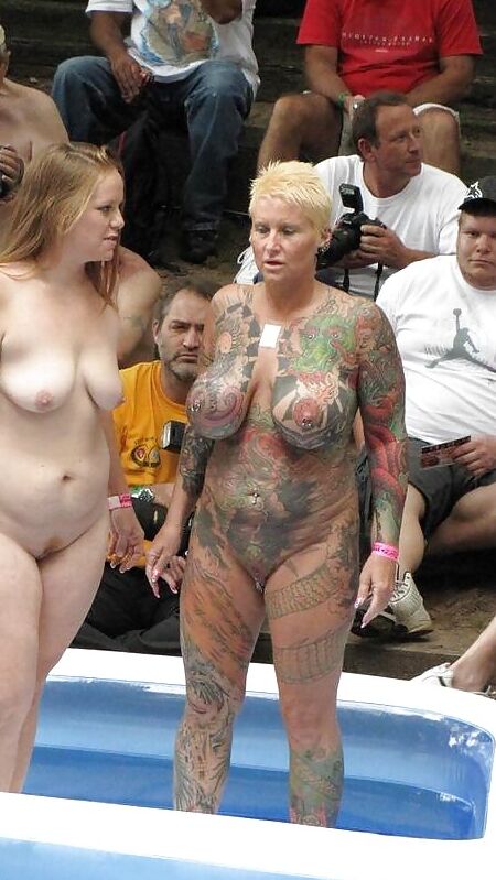 Tattooed mature Janine