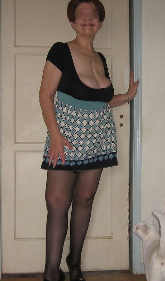 Brunette granny with big tits