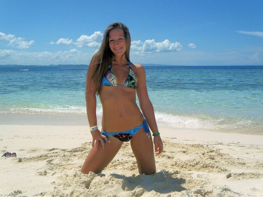Sarah Takes On Tiny Blue String Bikini