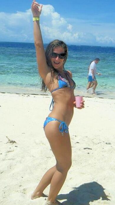 Sarah Takes On Tiny Blue String Bikini