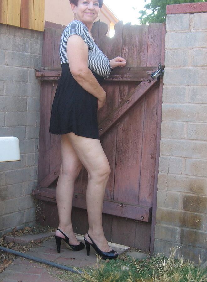 Brunette granny with big tits