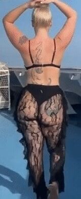 Asses in see through and chaps