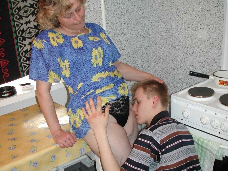 Mature in the kitchen with a junior