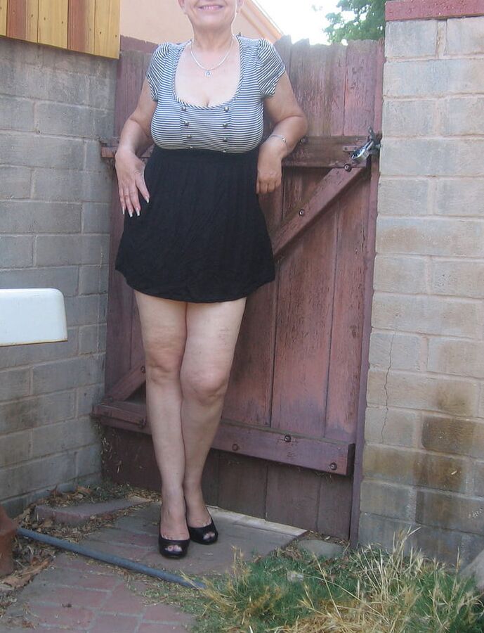 Brunette granny with big tits