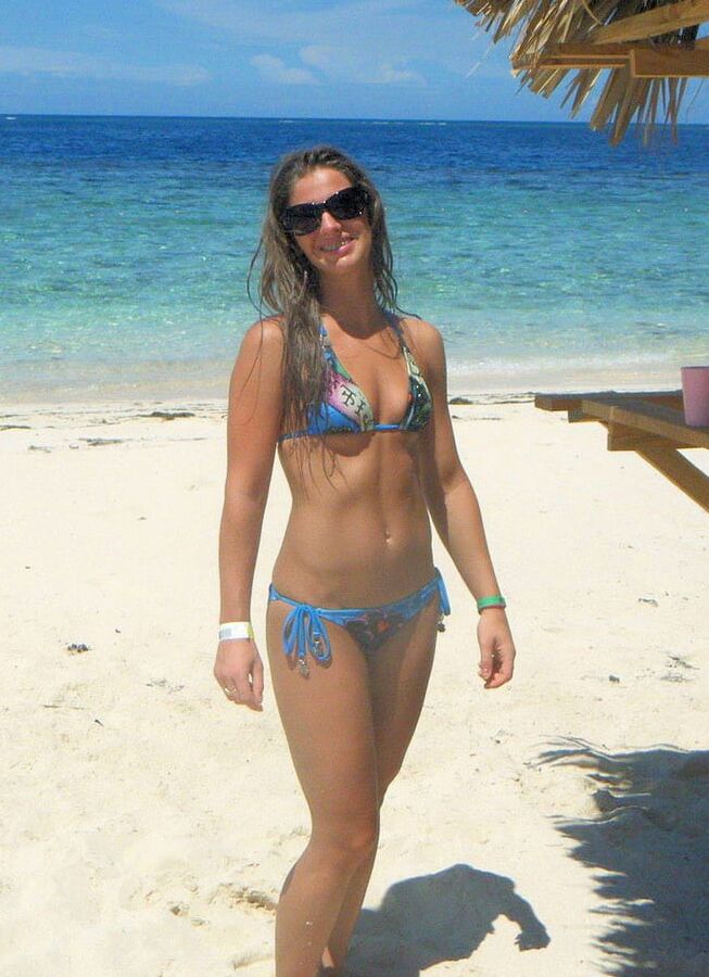 Sarah Takes On Tiny Blue String Bikini