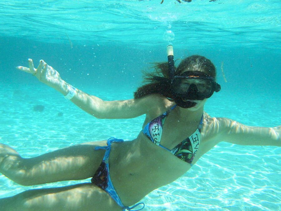 Sarah Takes On Tiny Blue String Bikini