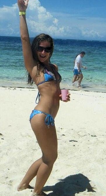 Sarah Takes On Tiny Blue String Bikini