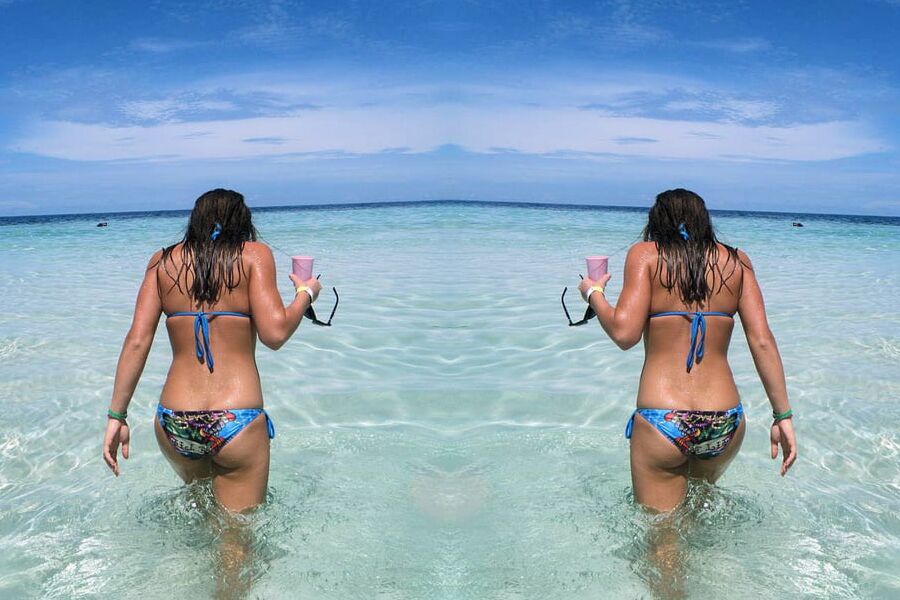Sarah Takes On Tiny Blue String Bikini