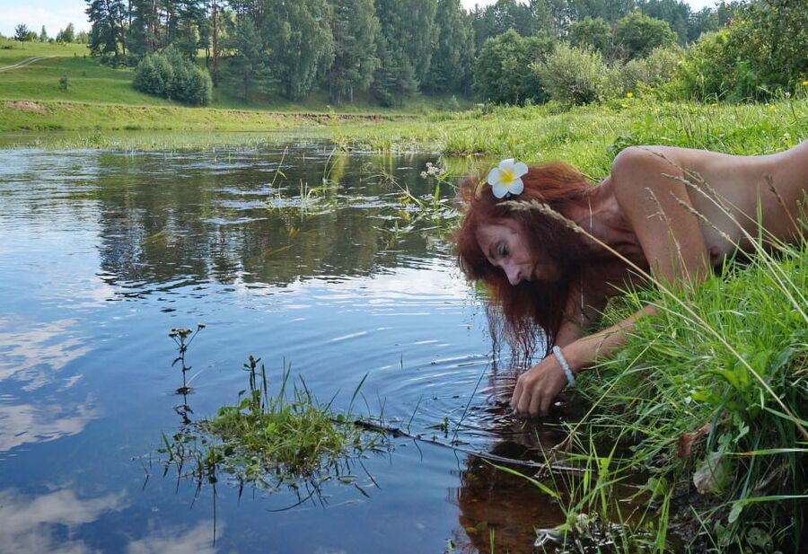 Mermaid plays with water
