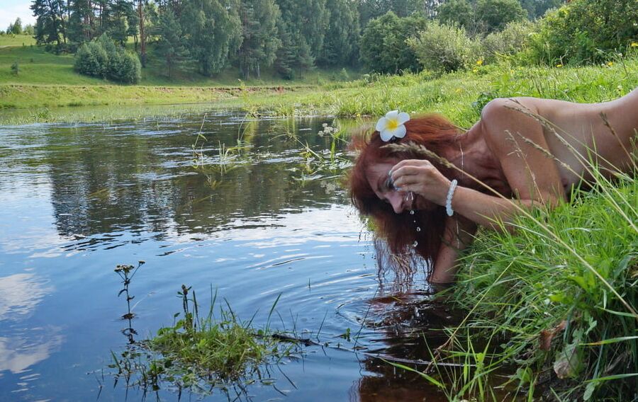Mermaid plays with water