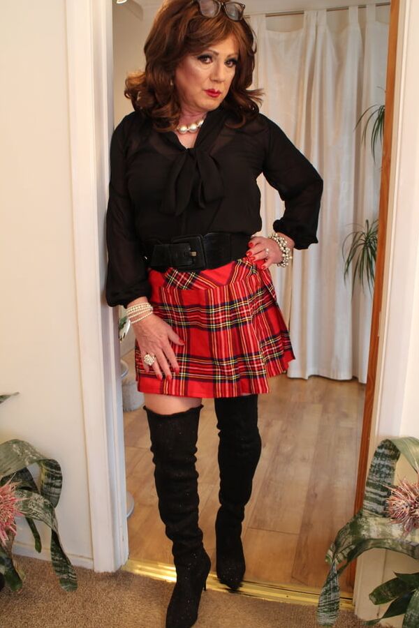 Black satin blouse and red mini kilt with OTK boots
