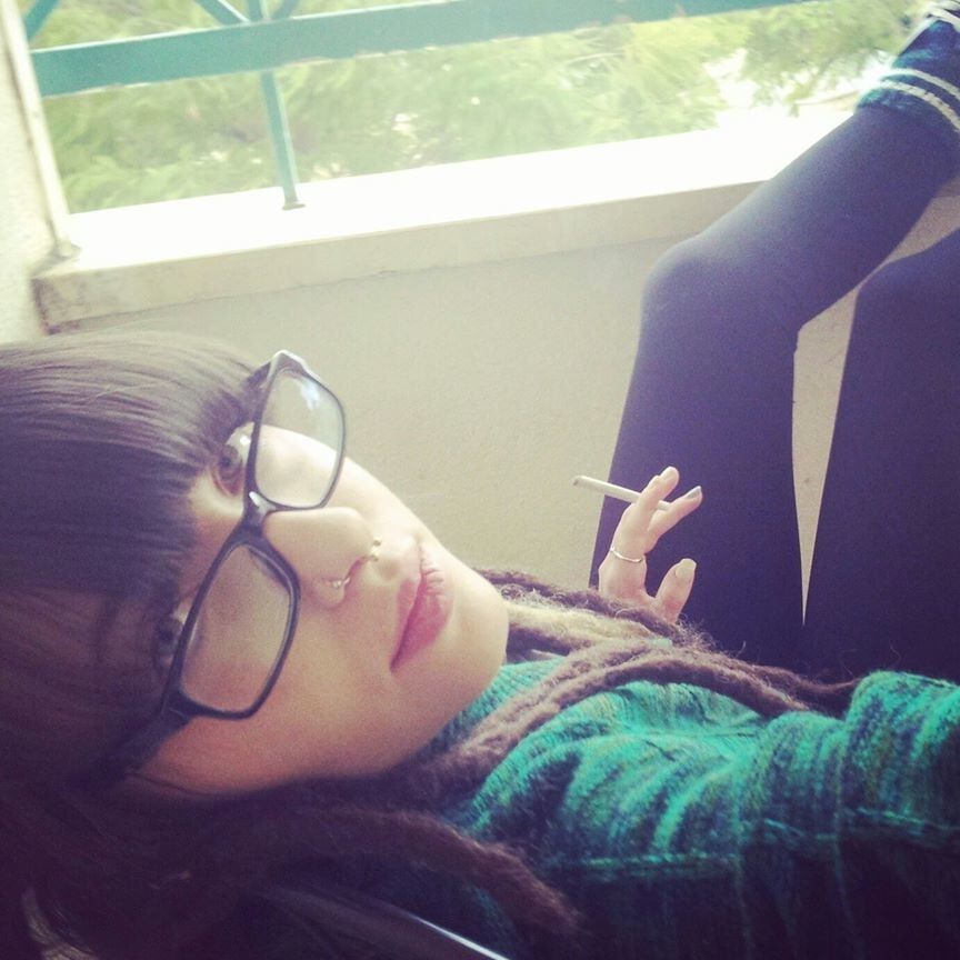Jewish Hippie Party girl smoking