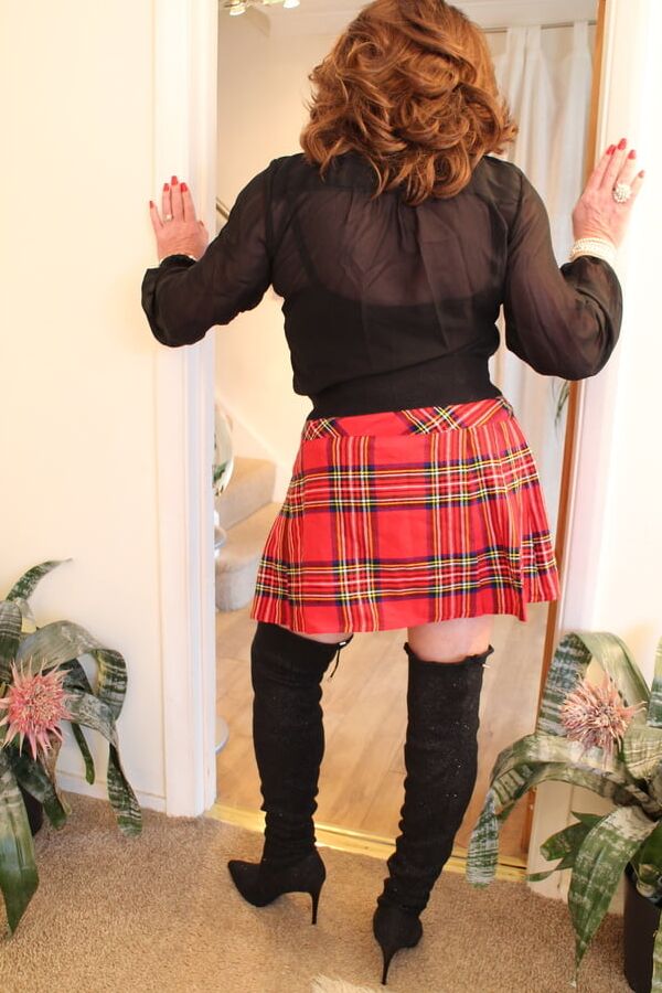 Black satin blouse and red mini kilt with OTK boots