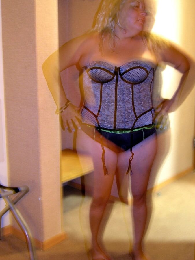 Hot MILF Poses With Remote Vibrator Inside Her Panties
