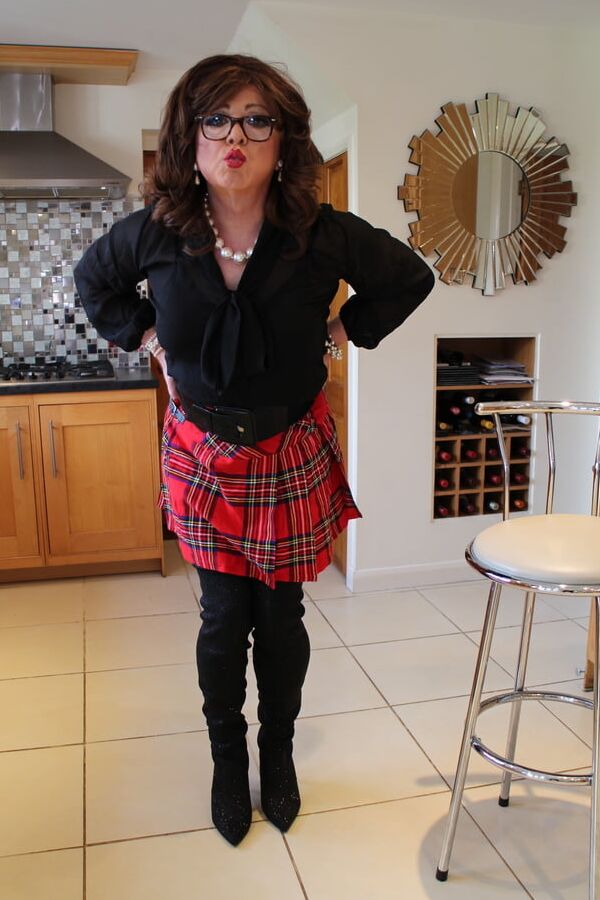 Black satin blouse and red mini kilt with OTK boots