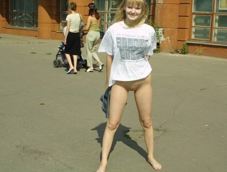 Nice blonde flashes boobs and pussy at public