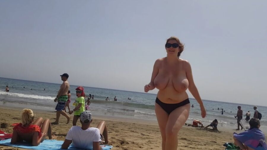 Busty topless beach