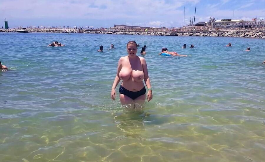 Busty topless beach