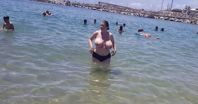 Busty topless beach
