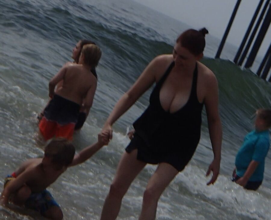 busty milf showing big cleavage