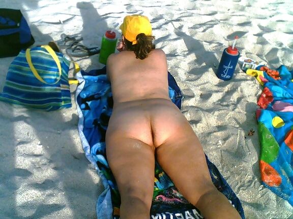My wife on the beach over the years.