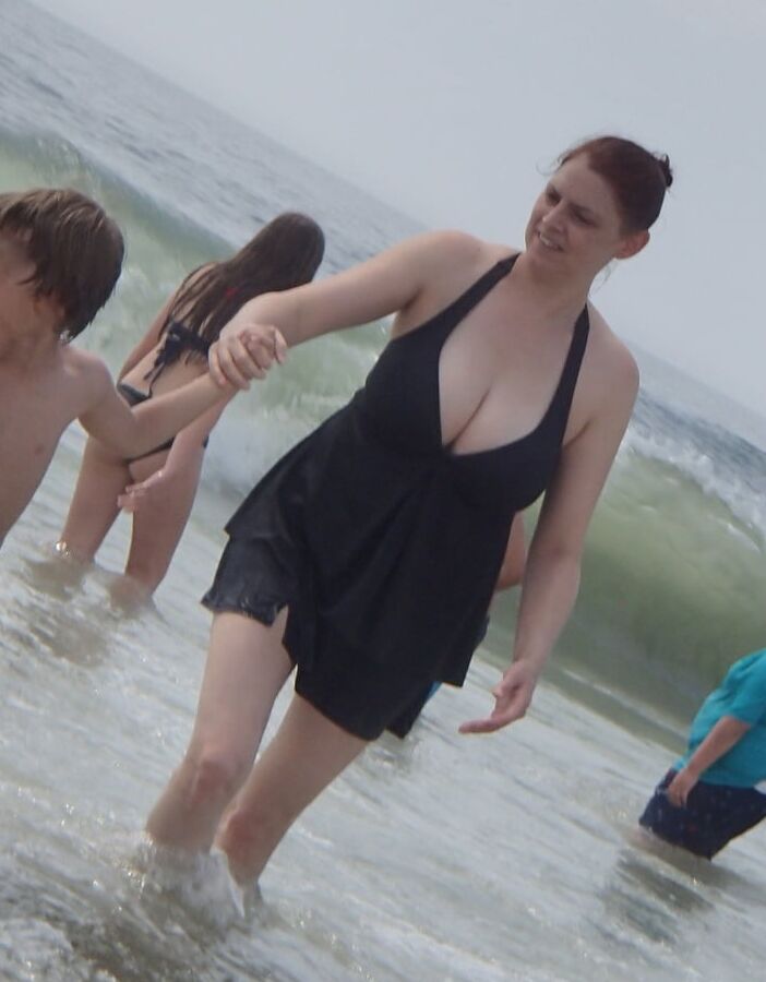 busty milf showing big cleavage