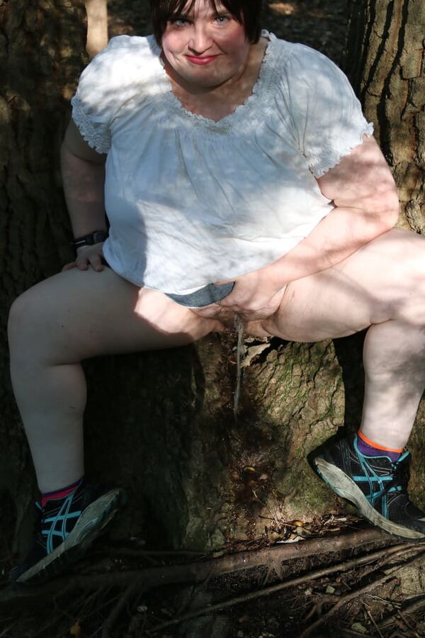 Kaylee pissing in the woods