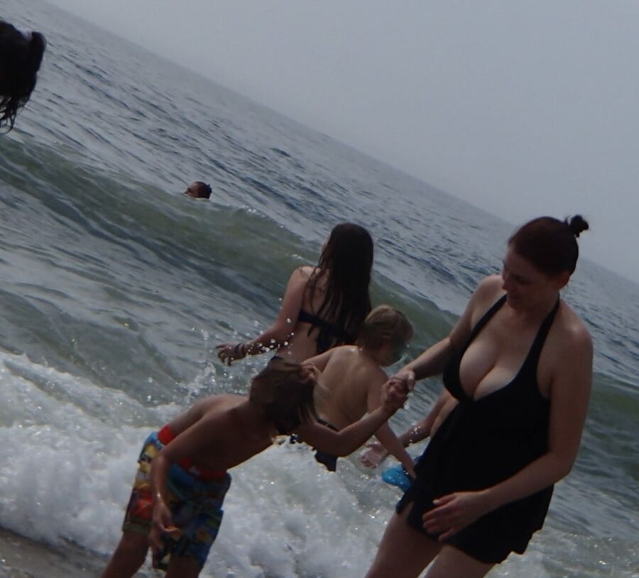 busty milf showing big cleavage