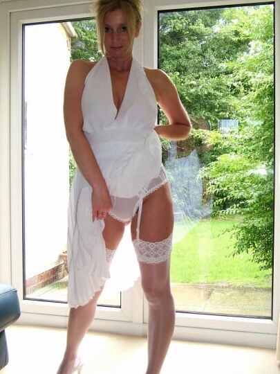 Glamorous Mature in sexy tan stockings