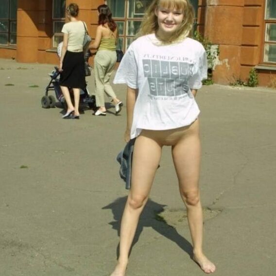 Nice blonde flashes boobs and pussy at public