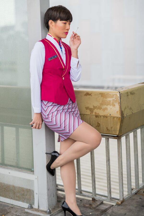 Asian Flight Attendant in Pantyhose