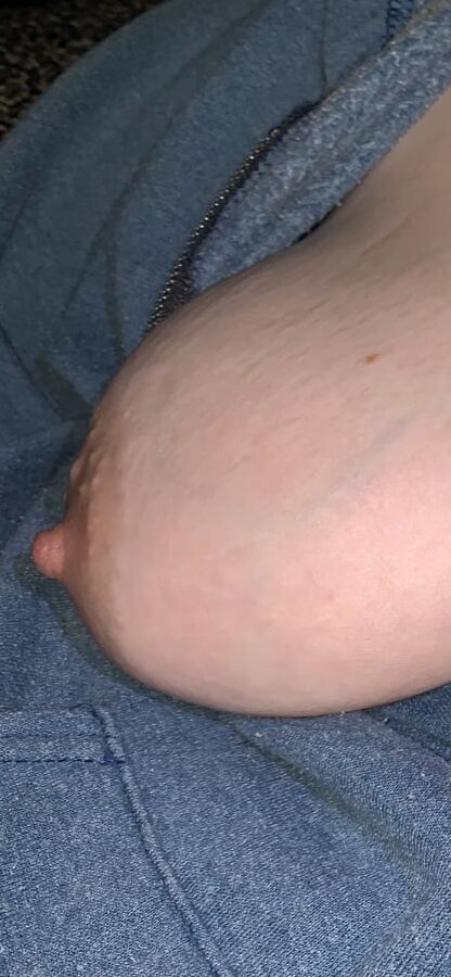 Big saggy tits. Unzipped and coming out.