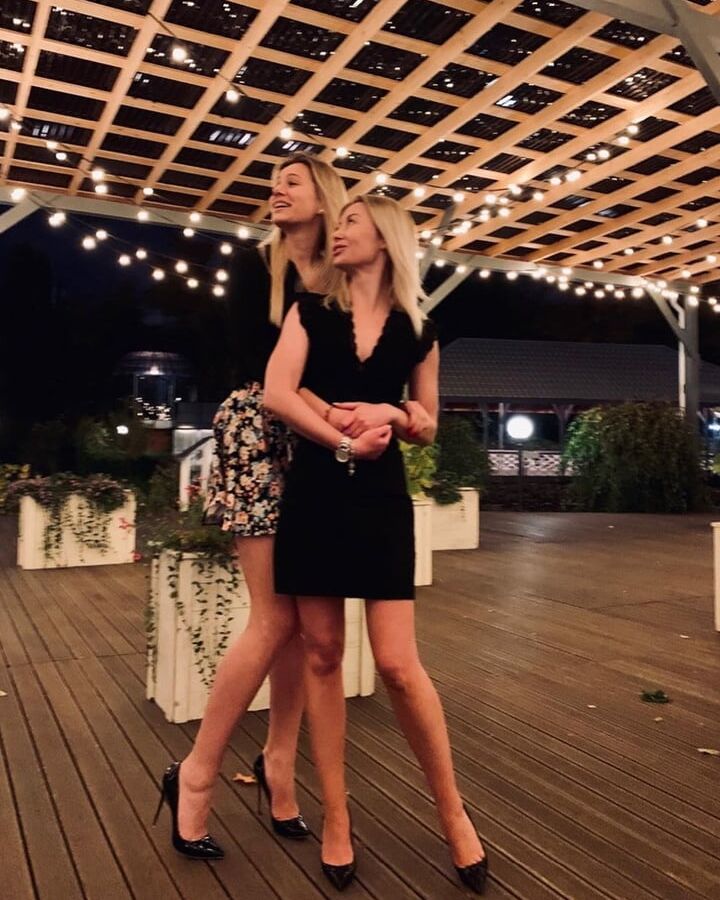 Legs and heels of another one friend