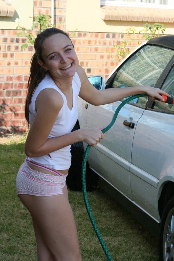 Slutty Davida getting wet and naked washing her car outside