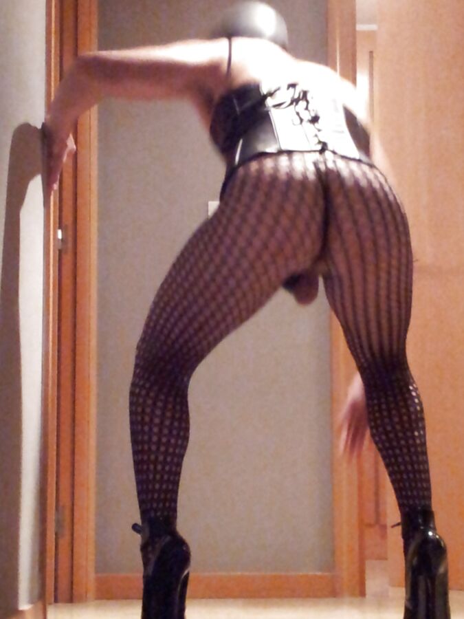 Fishnets and black patent heels