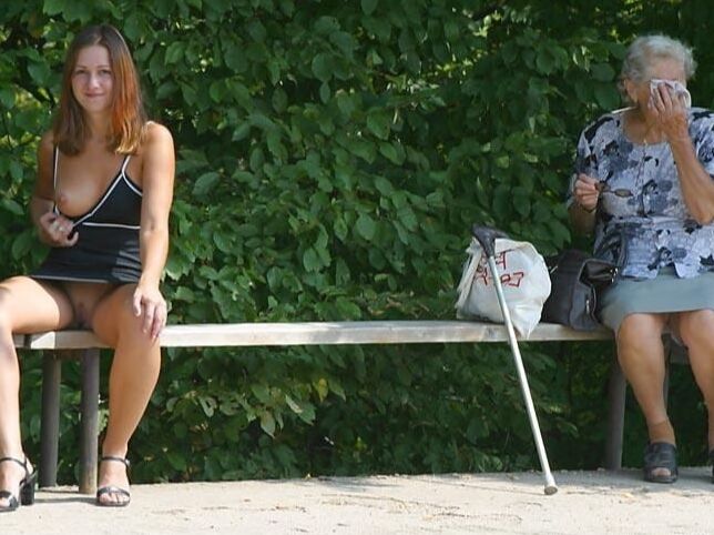 Private hot redhead girl with big tits nude in public park