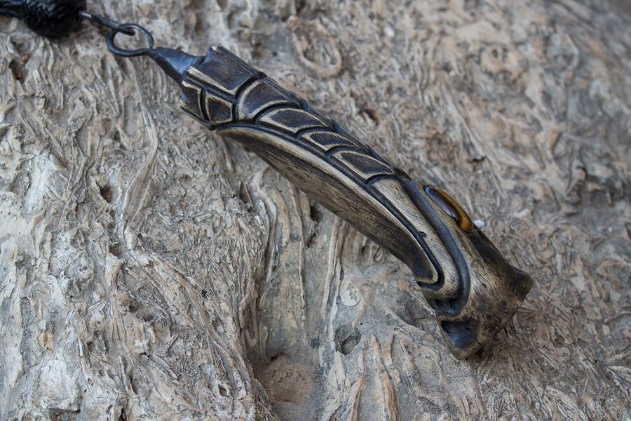 Gavial. -tail leather braided flogger.
