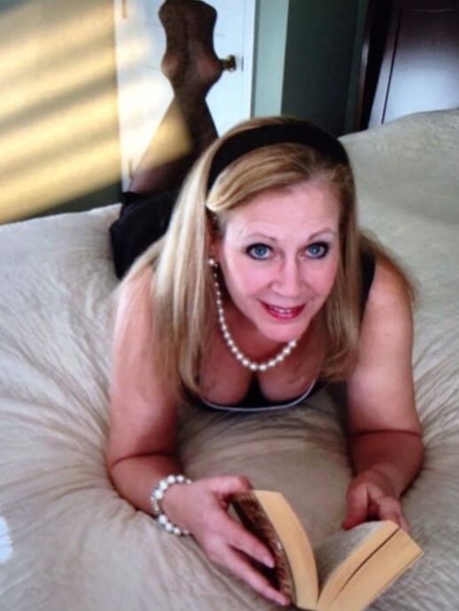 Mature flight attendant Julie