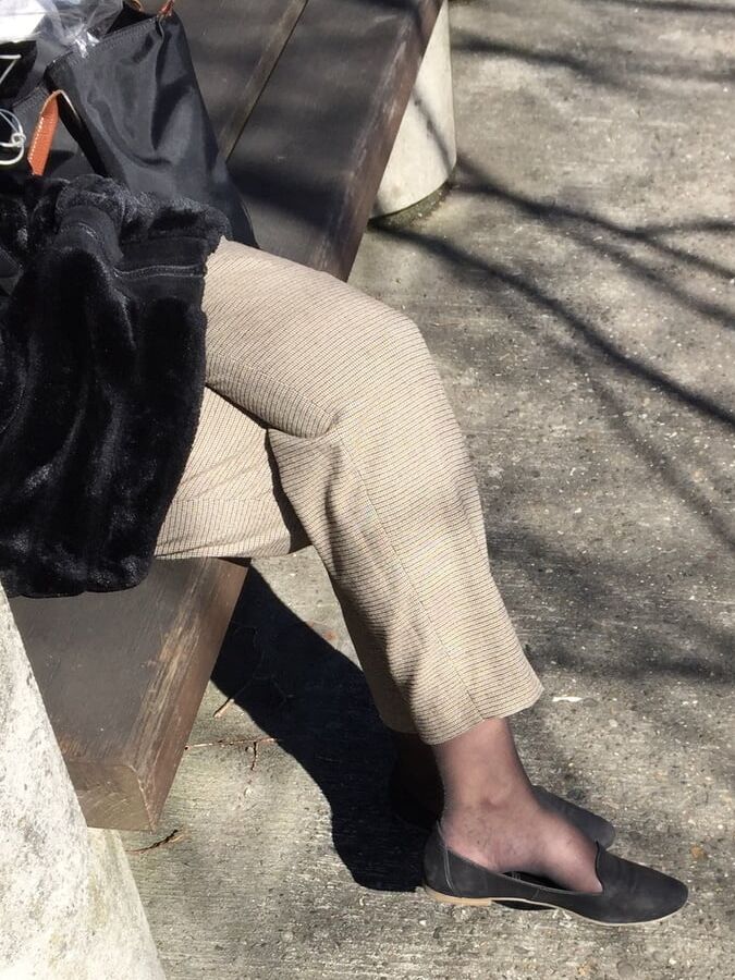 Girl showing some parts of her nice black hosed legs &amp; feet
