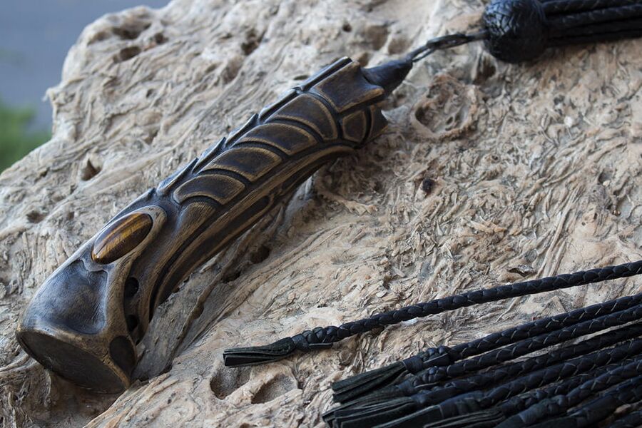 Gavial. -tail leather braided flogger.
