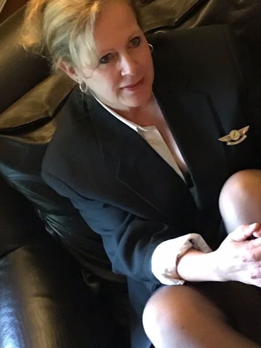Mature flight attendant Julie