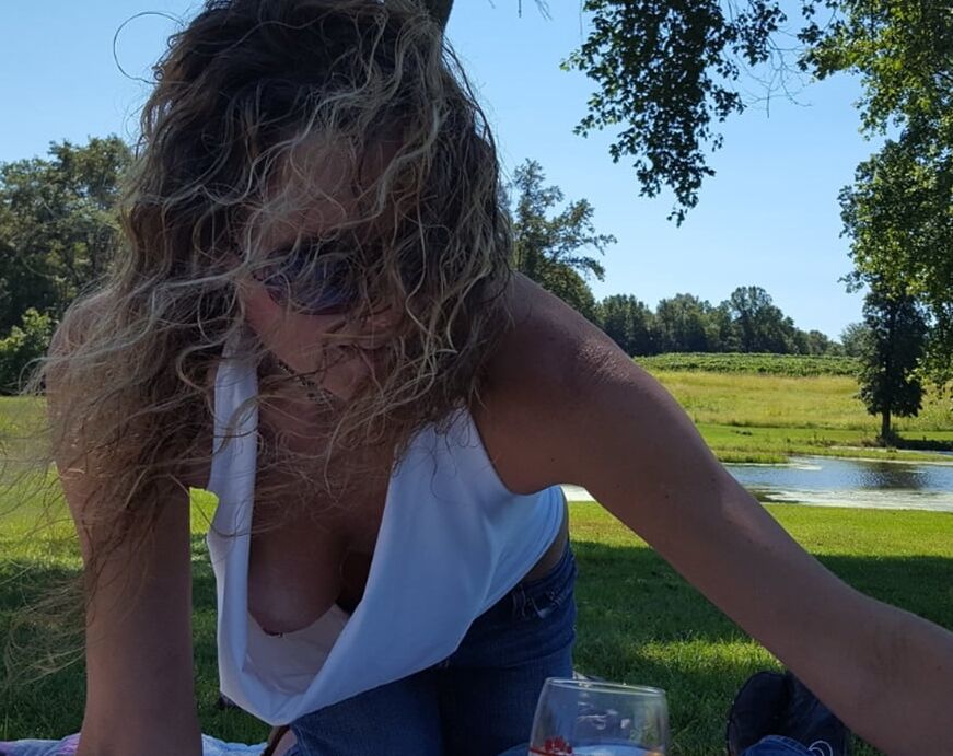 She loves two things, showing her tits and blowing dick