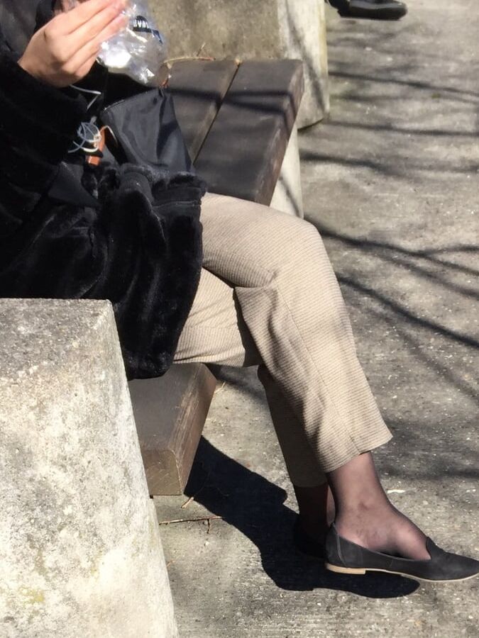 Girl showing some parts of her nice black hosed legs &amp; feet