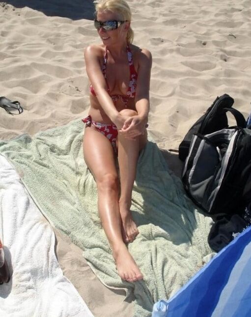 curly haired blond mega milf