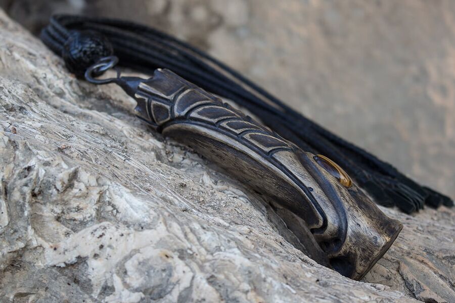 Gavial. -tail leather braided flogger.