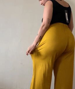 Sexy ass in black see through pants and black thong